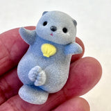 Flocked Sea Otters Blind Capsule